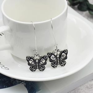 Skull butterfly black enamel earrings NEW